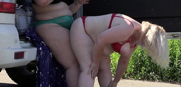  Voyeur spying on two fat lesbians who make a sex film near the car. Mature girlfriends with big asses behind the scenes. Fetish outdoors.